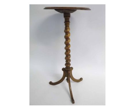 Light oak oval pedestal table on twisted support with tripod base, 38cms wide  