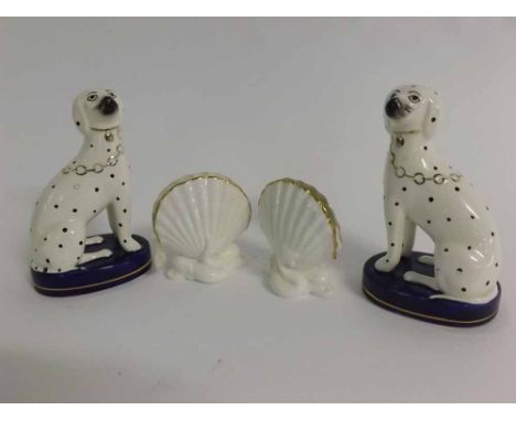 Pair of miniature Staffordshire seated Dalmatians on a blue oval plinth with gilded rim, together with two Royal Worcester me