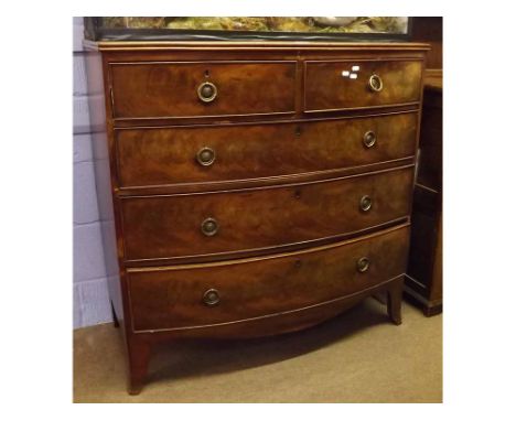 19th century mahogany bow fronted two over three full width drawer chest with brass ringlet handles, raised on splayed bracke