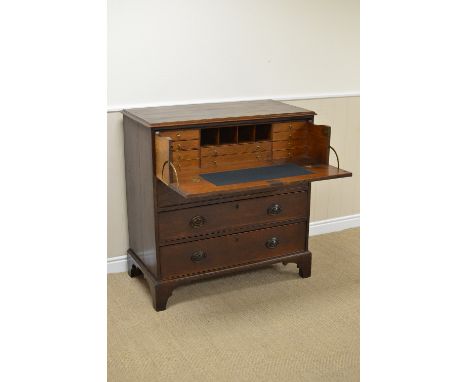 A Georgian oak Secretaire Chest with fitted interior above three long graduated drawers on bracket feet, 3ft 4in