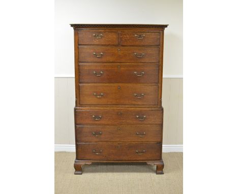 An 18th Century oak Chest on Chest with dentil frieze above two short and six long graduated drawers on ogee bracket feet, 3f