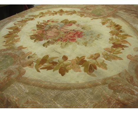 An Aubusson type woolwork Tapestry or Carpet with central oval floral medallion, poor condition