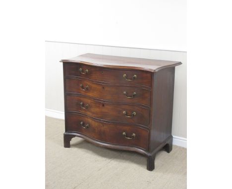 A George III mahogany serpentine Chest of four long graduated drawers with moulded top on bracket supports, 3ft 9in W x 3ft 1
