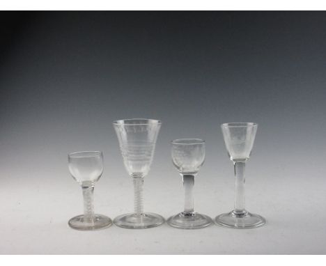 Four Georgian Wine Glasses, comprising a short double series opaque twist cordial with rounded bowl; a double series opaque t