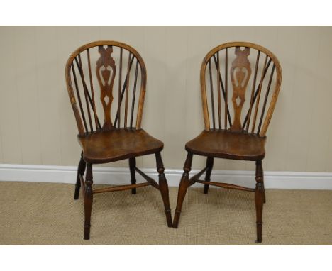 Three 19th Century Windsor Single Chairs in ash, elm, etc, pierced splat and stick backs, on turned legs united by H stretche