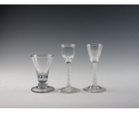 Three Georgian Wine Glasses, comprising a double series opaque twist with moulded round funnel bowl; a double series opaque t