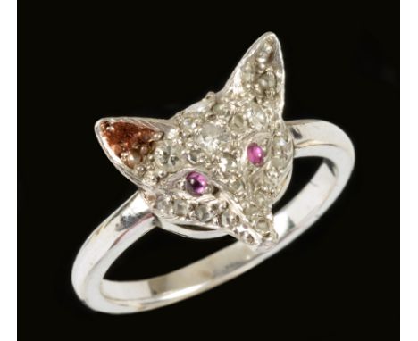 A Diamond Fox mask Ring pavé-set brilliant-cut diamonds and ruby cabochon eyes in white gold stamped 9ct, ring size L