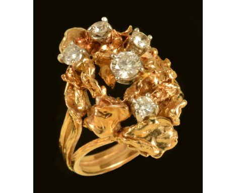 A 1970's Diamond Cocktail Ring the rustic openwork plaque claw-set five brilliant-cut stones in 18ct gold, ring size L