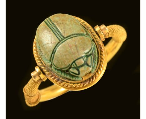 An Egyptian style Ring set faience Scarab, ring size L
