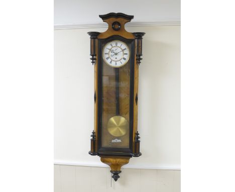 A 19th Century Vienna Wall Clock with white enamel circular dial, single weight driven movement, in glazed case