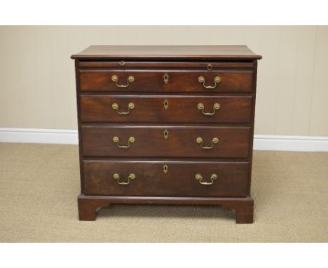 An 18th Century mahogany Chest of Drawers, the moulded top above a brushing slide and four long drawers raised on bracket fee