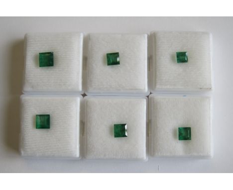 Six unmounted step-cut Emeralds, total weight approx 6.0cts
