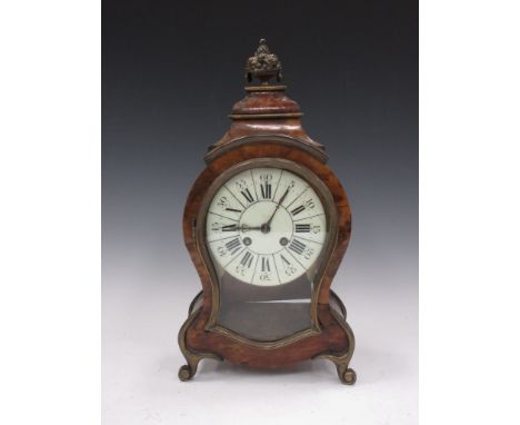 A 19th Century tortoiseshell Mantel Clock of waisted form with basket of fruit finial, ivorine dial and mounted upon brass sc