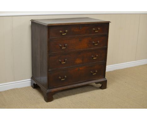 A late 18th Century oak Chest of four long graduated drawers on bracket feet, 3ft 1 1/2in