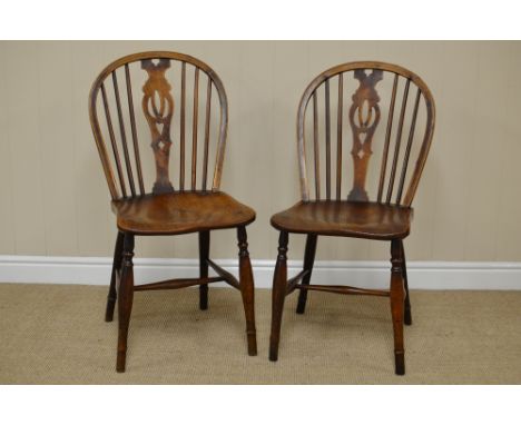 Pair of 19th Century Windsor Single Chairs in ash, elm, etc, pierced splat and stick backs, on turned legs united by H stretc