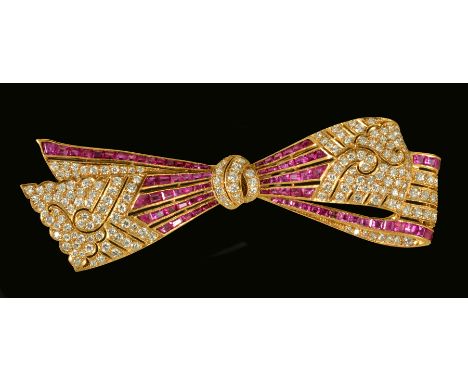 A Ruby and Diamond Bow Brooch millegrain-set calibre-cut rubies and brilliant-cut diamonds throughout in 18ct gold