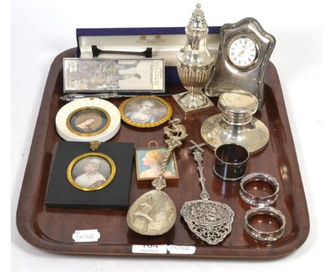 Two Dutch silver spoons, silver caster, silver caps and inkwell, silver gilt handled paper knife, silver handled paper knife,