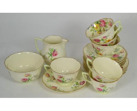A Royal Doulton Moss Rose pattern part tea service for six comprising tea cups saucers side plates cream and sugar