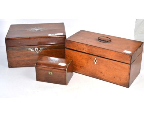 An early 19th century two division tea caddy; a Victorian rosewood dressing travelling box and a small Victorian rosewood box