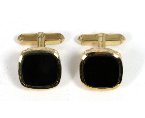 A pair of 9 carat gold onyx cufflinks, oblong onyx plaques to bark textured frames, to swivel backsGood condition. 13.7g gros