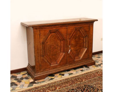 Walnut sideboard Italy, 20th centuryrectangular top with two doors below with geometric patterns114x171x53 cm.
