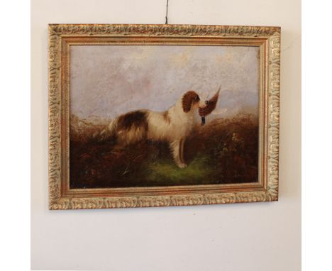 English painter 20th century"Hunting dog with pheasant", oil on canvas, signed at the bottom right, within gilded wooden fram