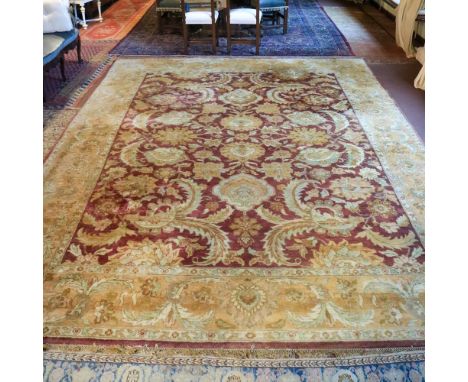 Oriental carpet 20th centurydecorated with floral and plant patterns on a red and gold background, defects435x308 cm.