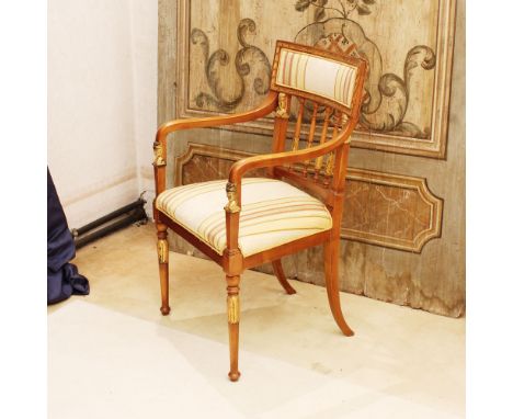 Wooden and golden wood armchair Italy, 20th centuryopenworked and carved backrest with Empire style motifs, fabric upholstere