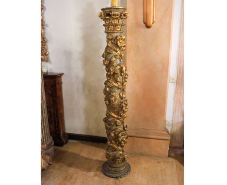 Lacquered and gilded wood column Italy, 18th centurytorchon body decorated with floral and plant elements. Defectsh.171 cm.