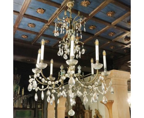Eight-lights chandelier Italy, 20th centuryin bronze and glass, defects110x80 cm.