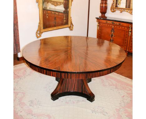 Wooden centerpiece table Italy, 20th centurycircular top resting on an architectural base, slight wears78x160 cm.