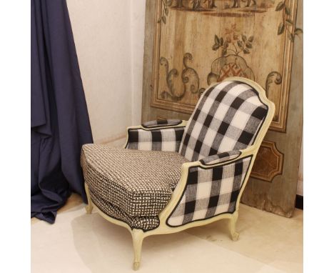 Lacquered wooden armchair Italy, 20th centurystructure carved with vegetal and volute motifs, curly feet, fabric upholstered 