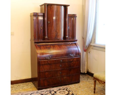 Biedermeier furniture in mahogany and mahogany feather Austria, 19th centurytwo-body structure, upper part with three doors d