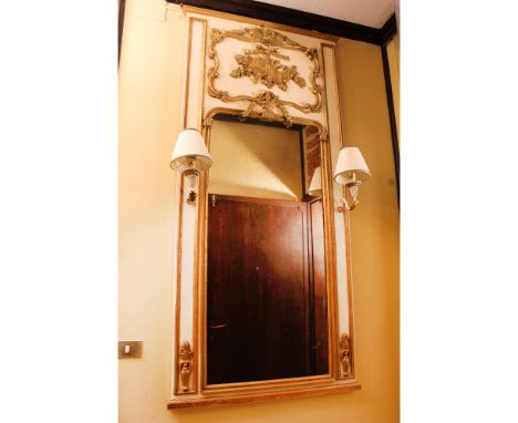 Lacquered and golden mirror Italy, 20th centuryrectangular frame decorated with vegetal, volutes and a musical triumph motifs
