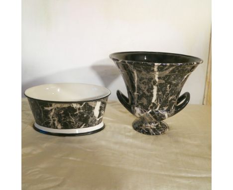 Two ceramic objects Italy, 20th centuryglazed to simulate marble, defectsh.28,5 cm.
