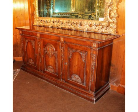 Walnut sideboard Italy, 20th centuryrectangular top with three doors underneath, carved with floral and plant motifs97x210x53