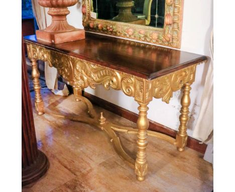 Wood and gilded wood console Italy, 20th centurycarved with plant motifs, legs turned and joined at the center by a cross83x1
