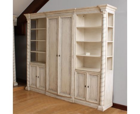 Lacquered wood bookcase Italy, 20th centuryfront with various compartments and six doors decorated with vegetal motifs, on th