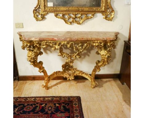 Gilded wood console Italy, 20th centurycarved and perforated with rich plant motifs and scrolls, shaped top in red marble93x1