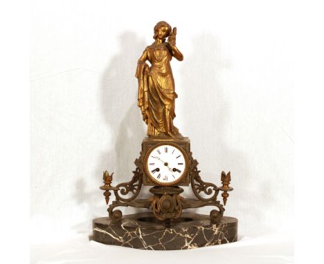 Bronze and marble table clock Italy, early 1900sgolden bronze chiseled body to depict a girl, glazed dial with Roman numerals