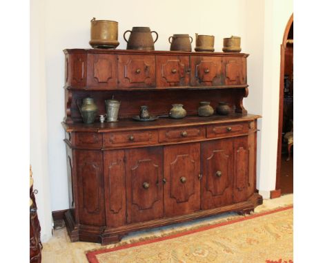 Walnut sideboard Italy, 17th-18th century.front with six doors and three drawers, burnished bronze knobs170x210x60 cm.