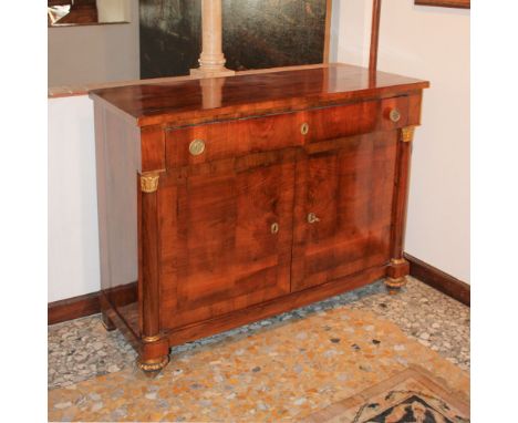 Walnut sideboard Italy, 19th centuryrectangular top with a drawer and two doors underneath, Empire-style applications in gild