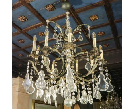 Ten-lights chandelier Italy, 20th centuryin bronze and crystal, defects80x75 cm.