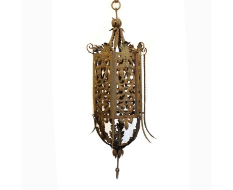Wrought iron lantern Italy, XIX-XX sec.openworked and forged with vegetal motifs120x57 cm.