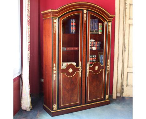Mahogany bookcase Italy, 20th centurybody decorated with golden wood profiles and golden bronzes chiseled with Empire-style m