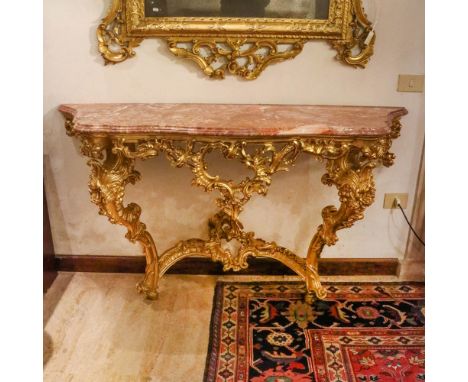 Gilded wood console Italy, 20th centurycarved and perforated with rich plant motifs and scrolls, shaped top in red marble93x1