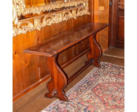 Walnut console Italy, 20th centuryrectangular top, resting on shaped line supports joined at the center by a cross79x190x41 c