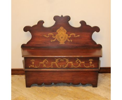 Bench in walnut stained wood Italy, 20th centuryshaped line structure decorated with coat of arms and opposite vegetal scroll