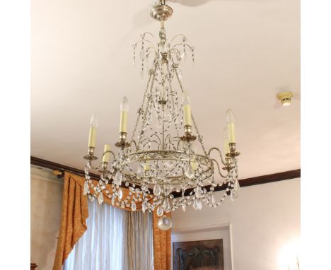 Eight lights silver metal chandelier Italy, 20th centurystructure decorated with vegetal garlands, moved line arms decorated 