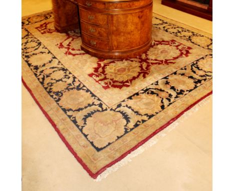 Oriental carpet 20th centurydecorated with floral and plant motifs on a beige, red and black background, wears and defects370